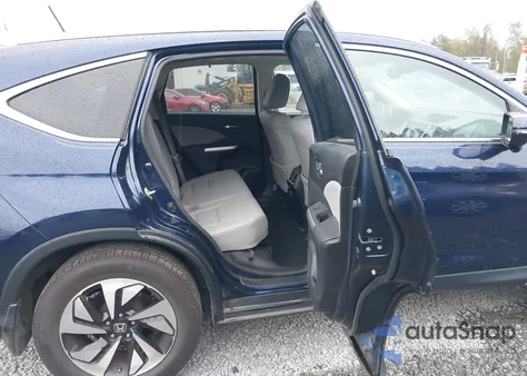 2016 Honda Cr-V Touring z USA, uszkodzony, nr VIN 5J6RM4H98GL055109